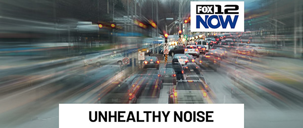 Congested city traffic with motion blur streaks, Fox 12 Now logo, and headline reading Unhealthy Noise.