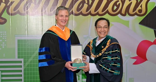 Brad Cardinal receiving honorary doctorate