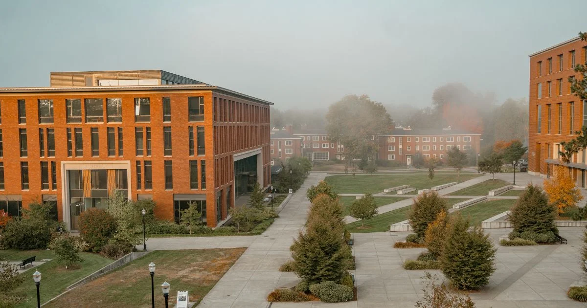 Austin Hall and LINC in the fall fog.