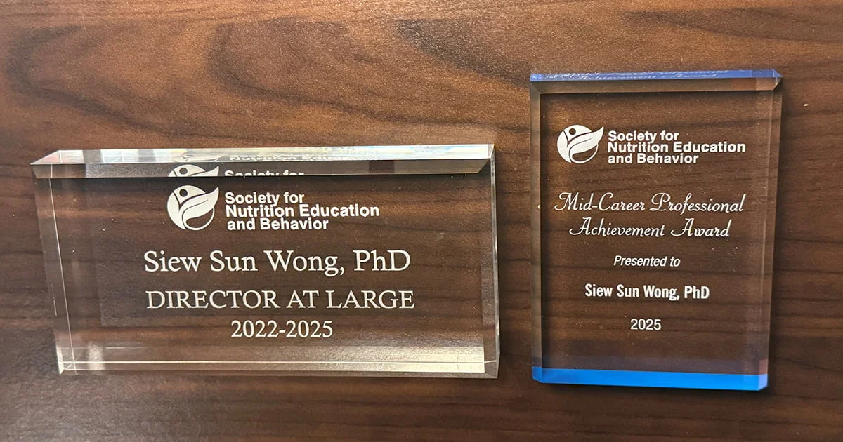 Awards presented to Siew Sun Wong, PhD, from the Society for Nutrition Education and Behavior, recognizing a directorial role and a 2025 Mid-Career Professional Achievement.