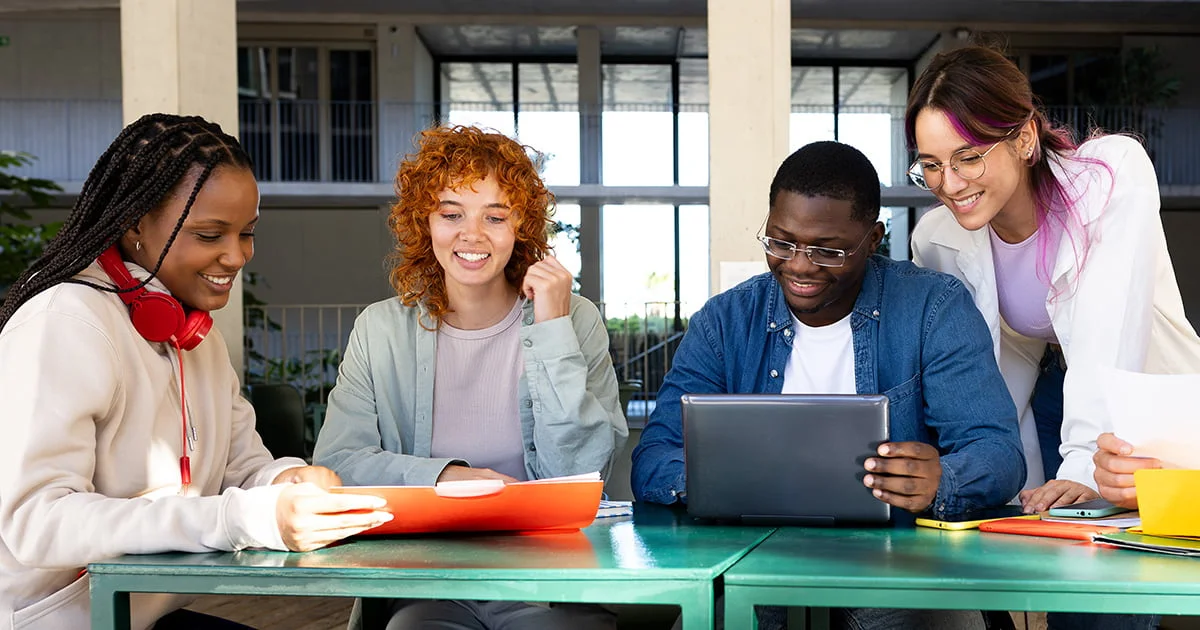 Students participating in a collaborative learning session for public health courses, illustrating the program's emphasis on teamwork, peer engagement, and modern educational environments.